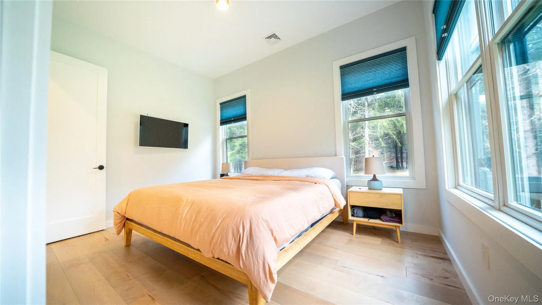 Bedroom with wood-type flooring Bedroom with wood-type flooring