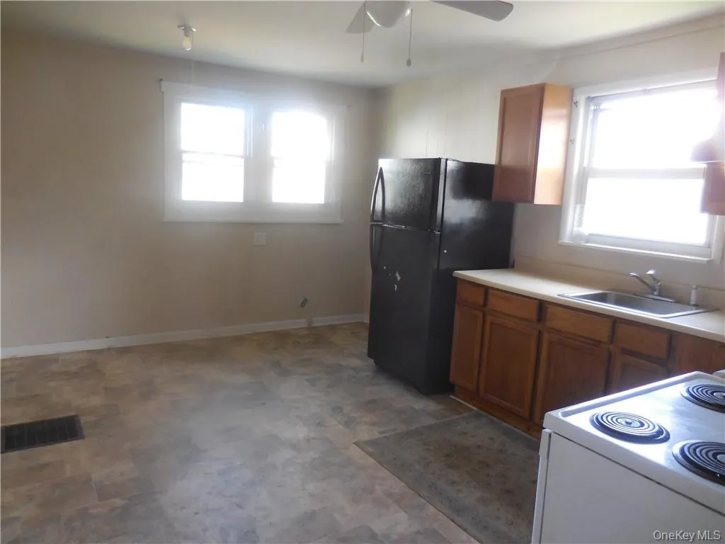 Eat in kitchen with dining area and window. Eat in kitchen with dining area and window.