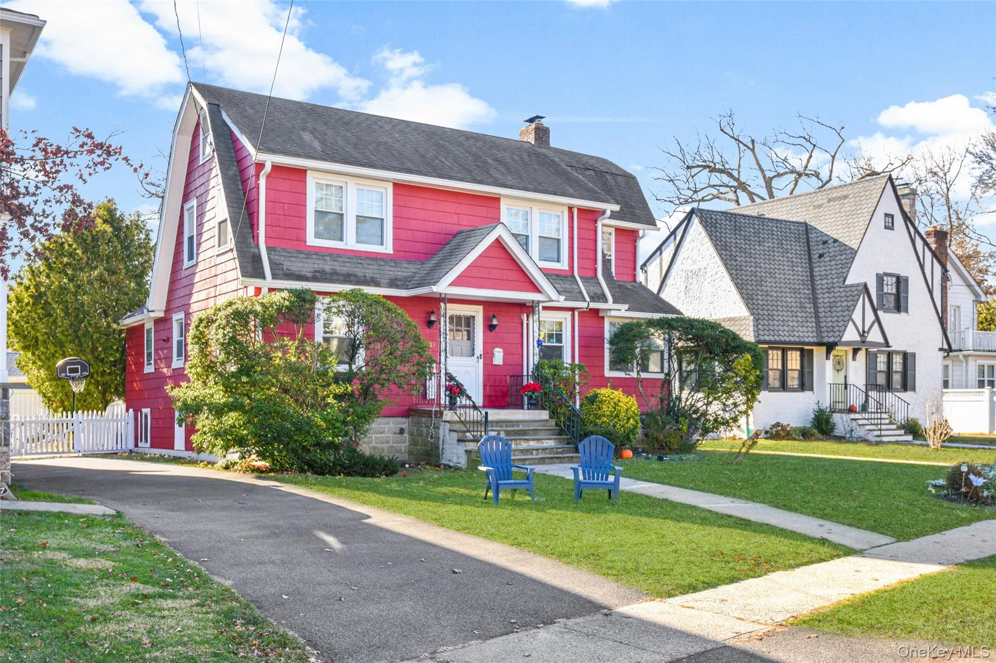 View of front of property featuring a chimney and roof with shingles View of front of property featuring a chimney and roof with shingles