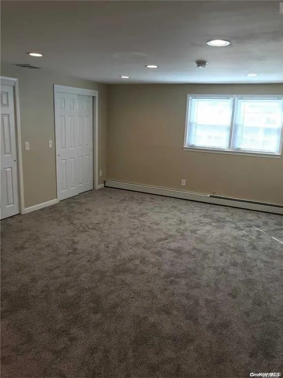 Large bedroom w/ great space and double closets Large bedroom w/ great space and double closets