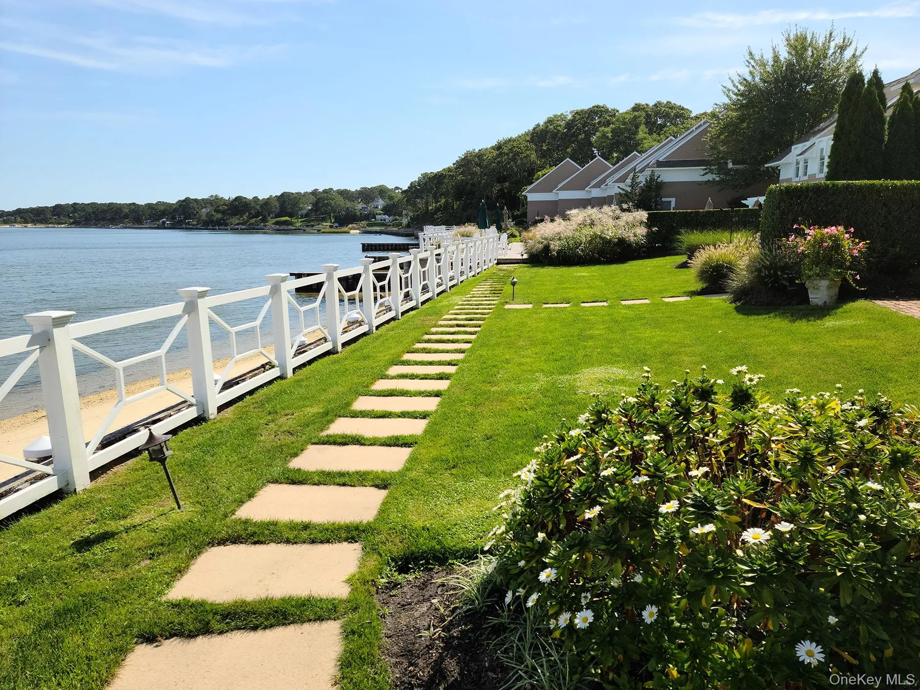 View of yard with a water view View of yard with a water view