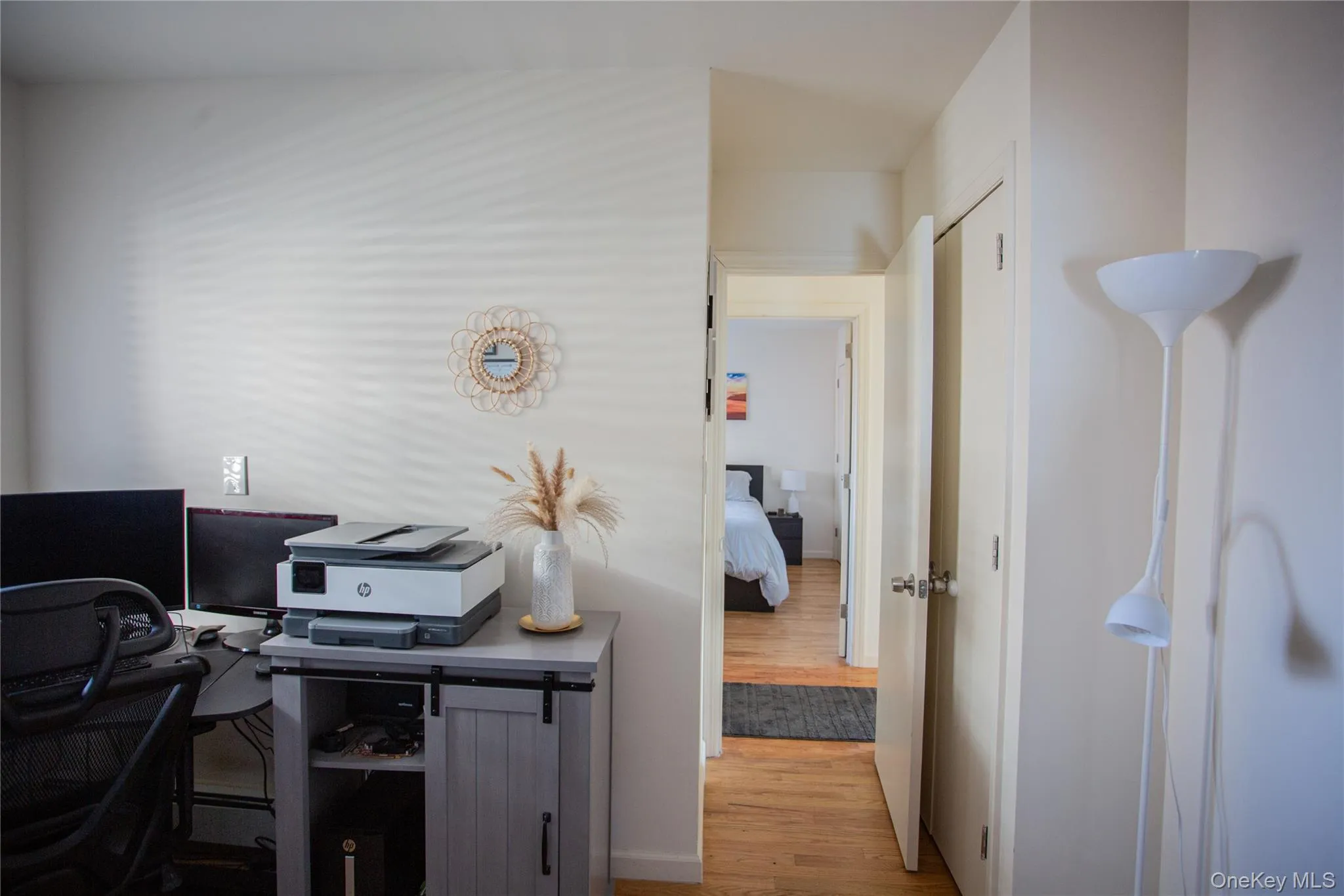 Home office featuring light wood-type flooring Home office featuring light wood-type flooring