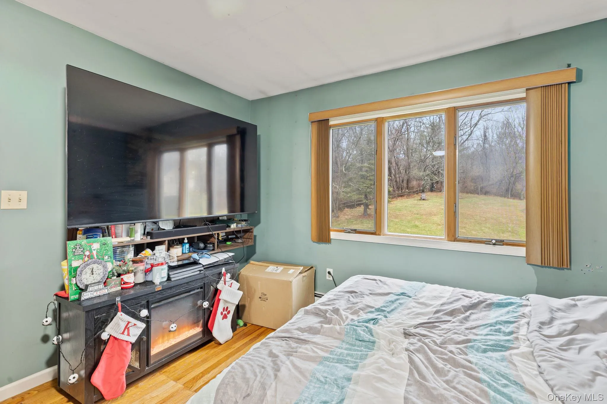 Bedroom with wood finished floors Bedroom with wood finished floors
