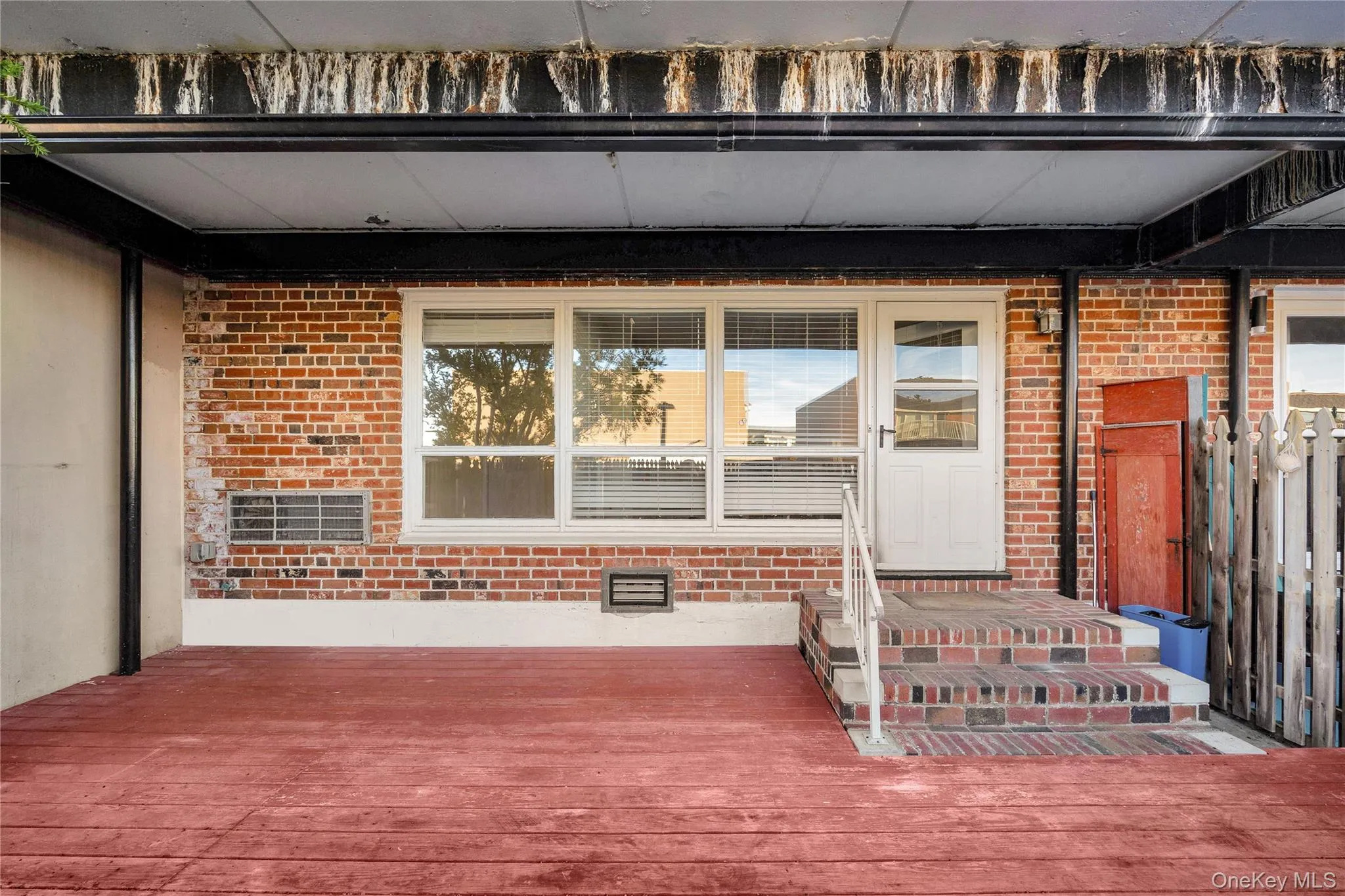View of exterior entry with brick siding View of exterior entry with brick siding