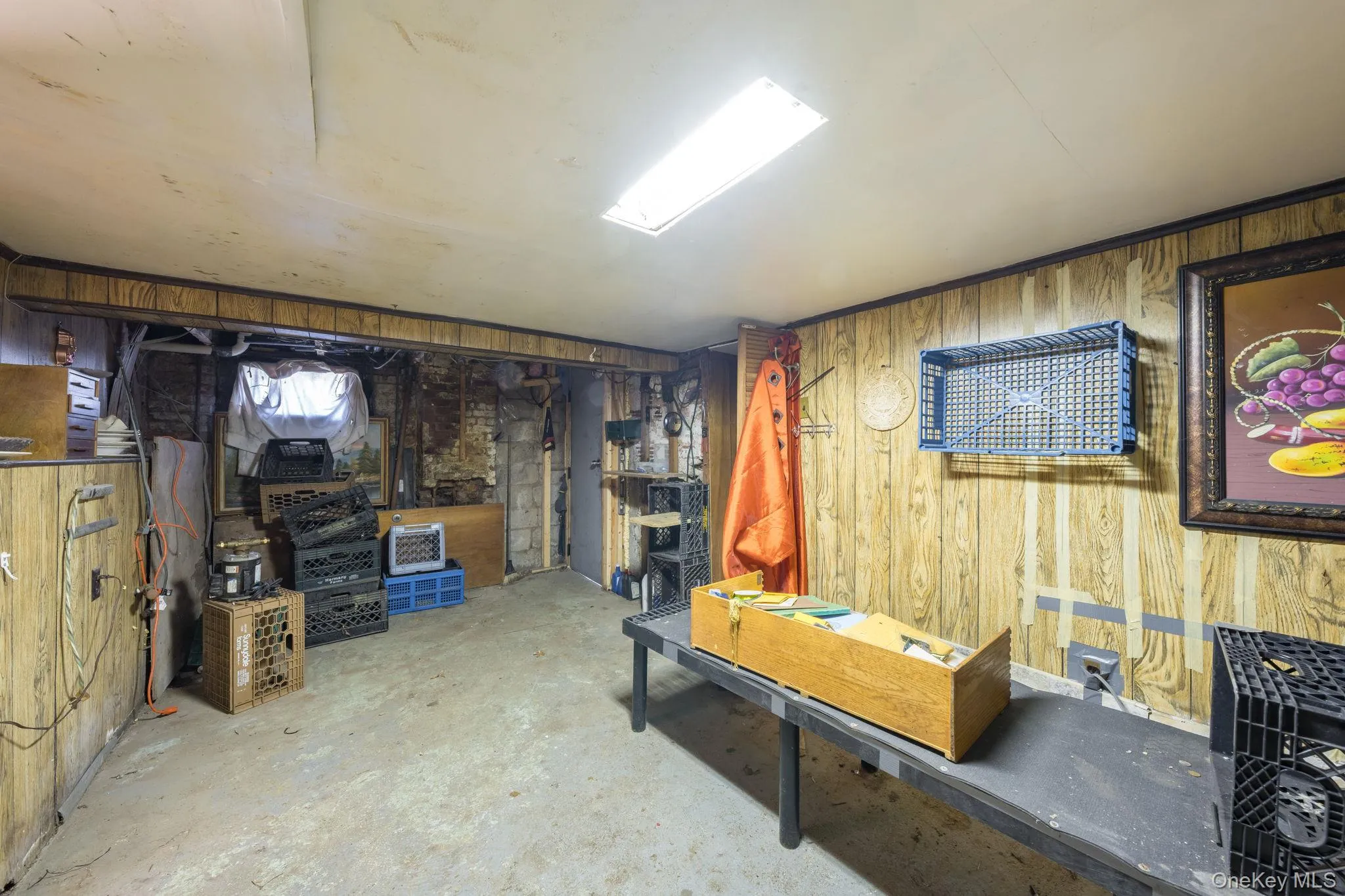 Finished basement featuring wood walls Finished basement featuring wood walls