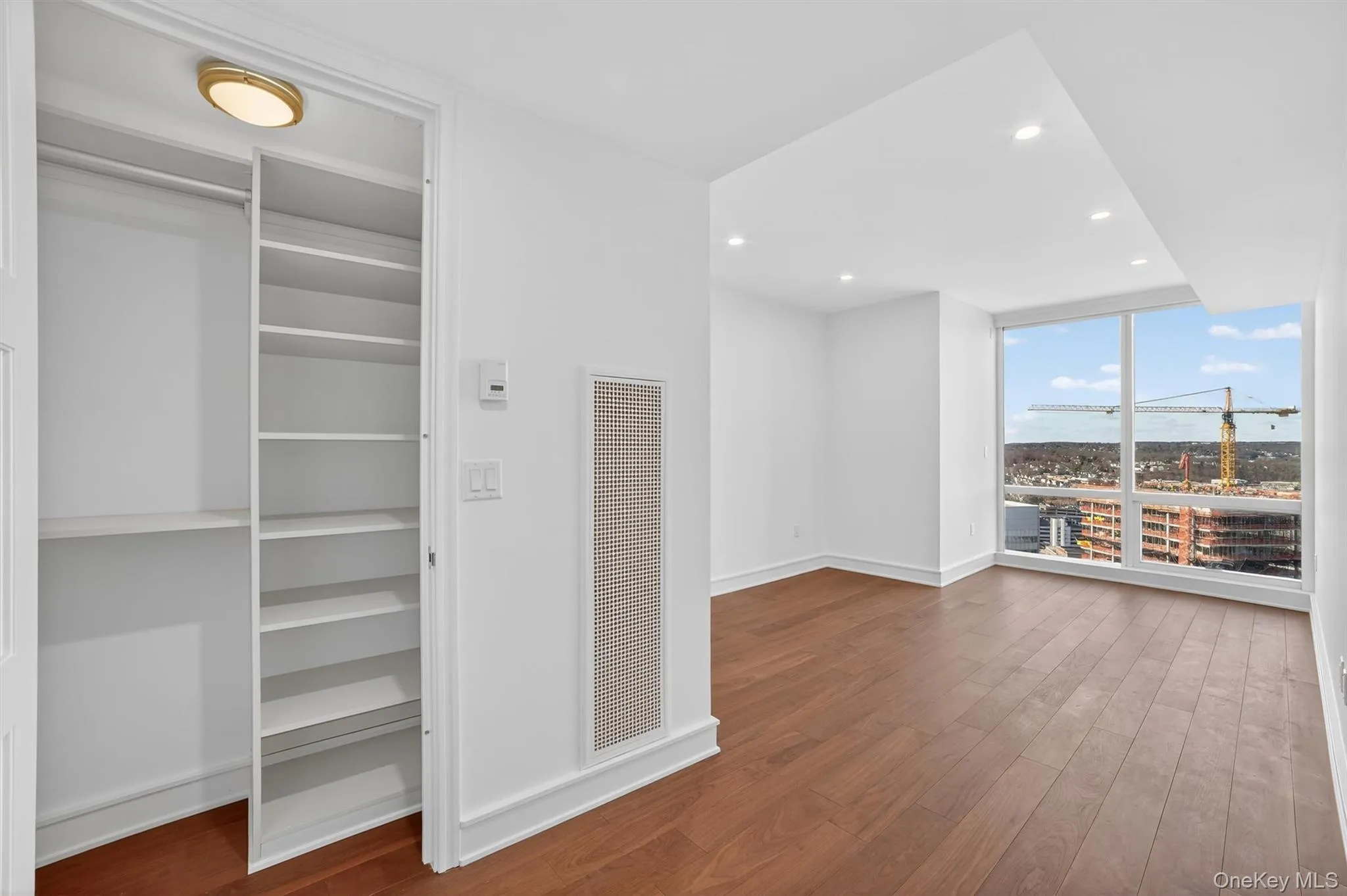 Closet with a heating unit Closet with a heating unit