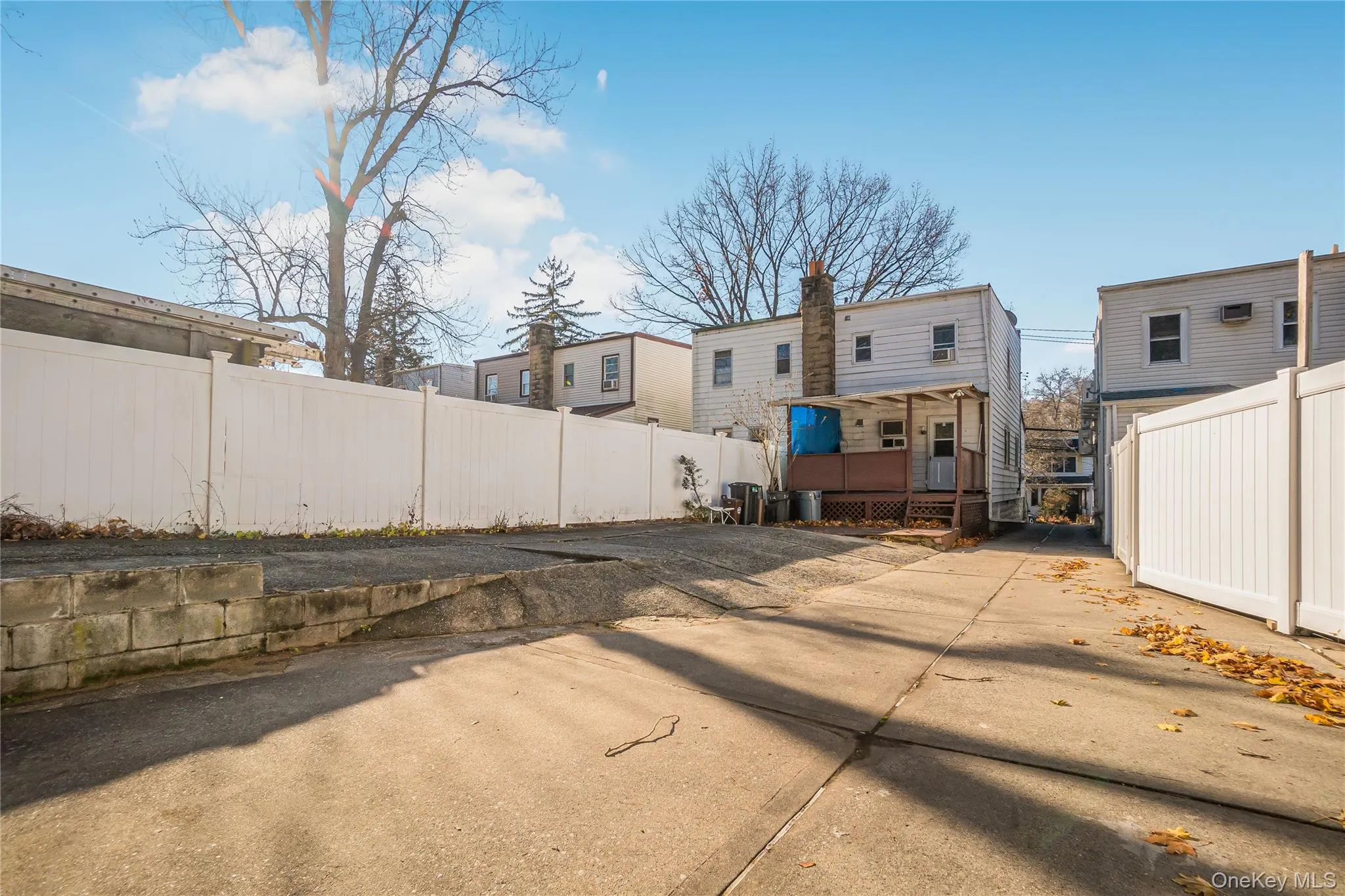 Rear view of property with a deck Rear view of property with a deck