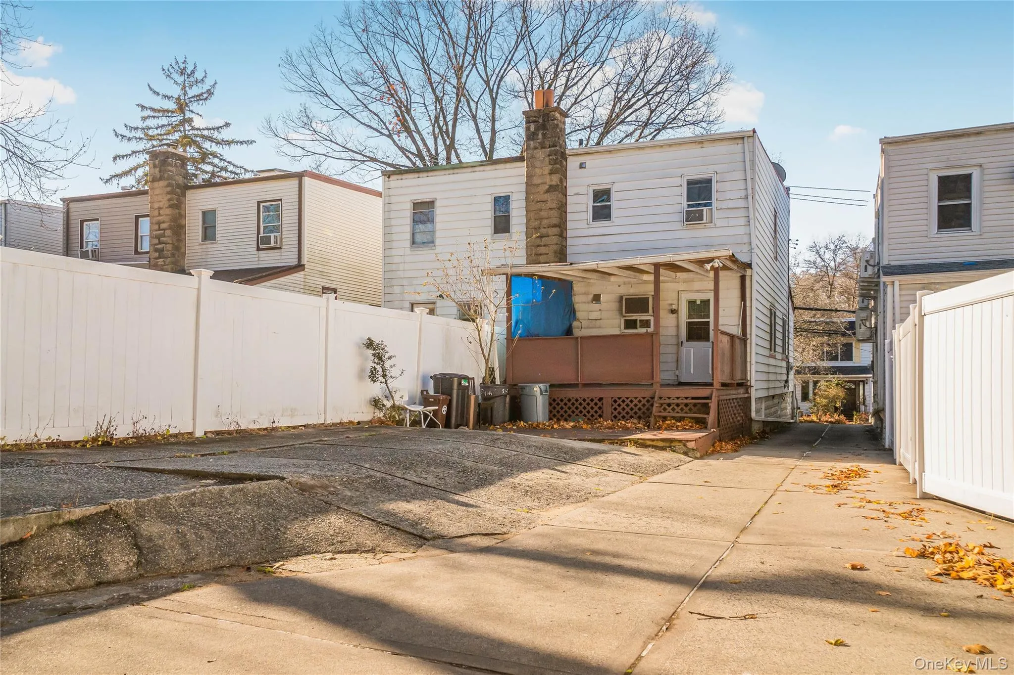 Back of house with a deck Back of house with a deck