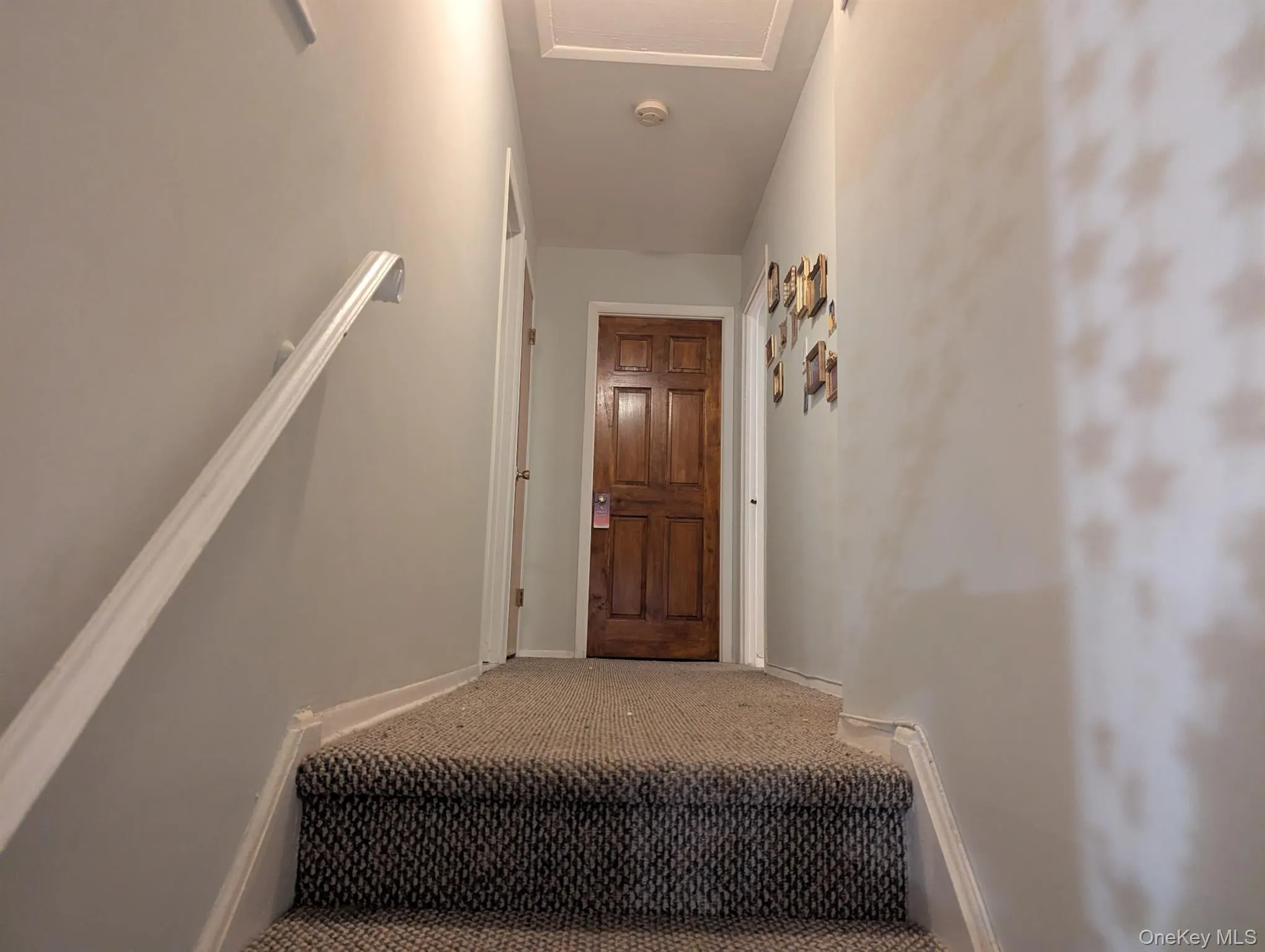 Staircase with carpet floors and baseboards Staircase with carpet floors and baseboards