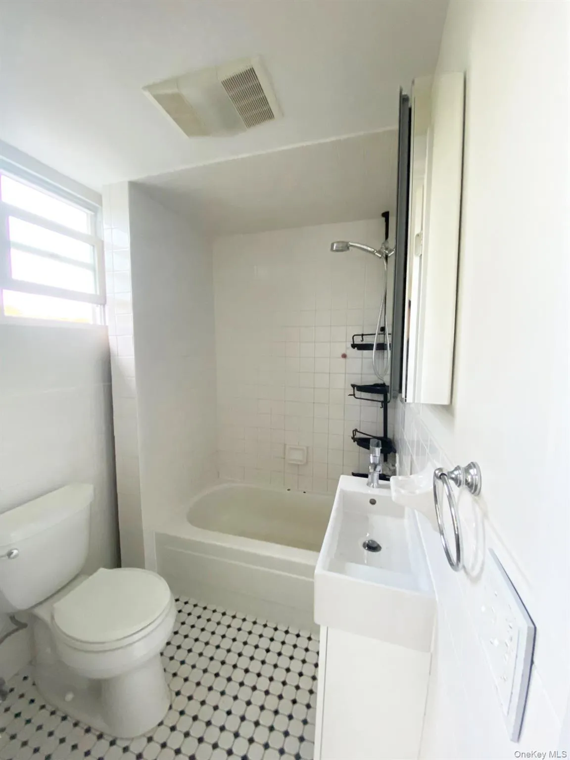 Full bath featuring vanity and shower / tub combination Full bath featuring vanity and shower / tub combination