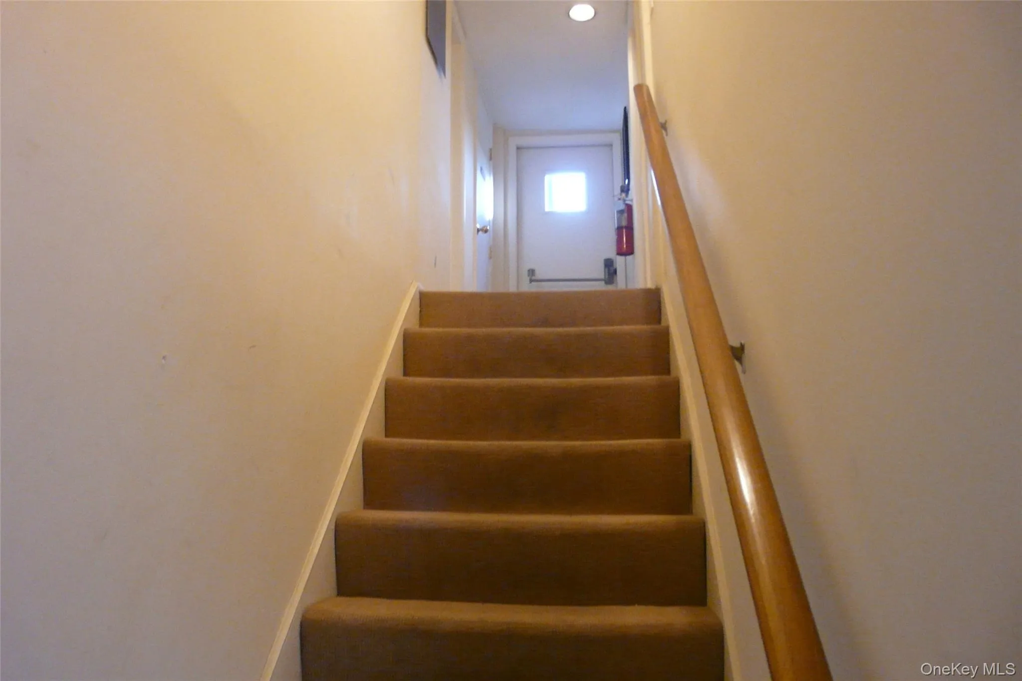 View of stairs. Office suite is on the left. View of stairs. Office suite is on the left.