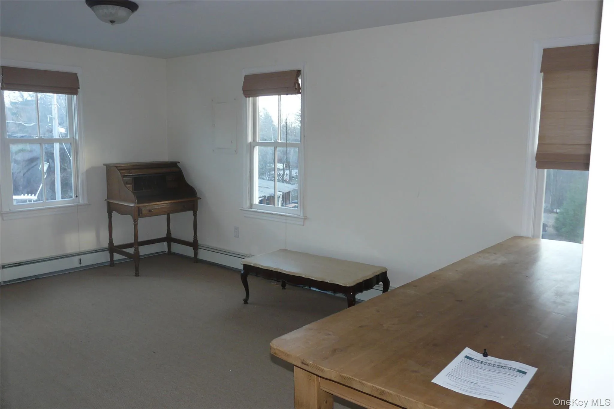 Second office area featuring plenty of natural light. Perfect as an office waiting room, anteroom or group project space. Second office area featuring plenty of natural light. Perfect as an office waiting room, anteroom or group project space.