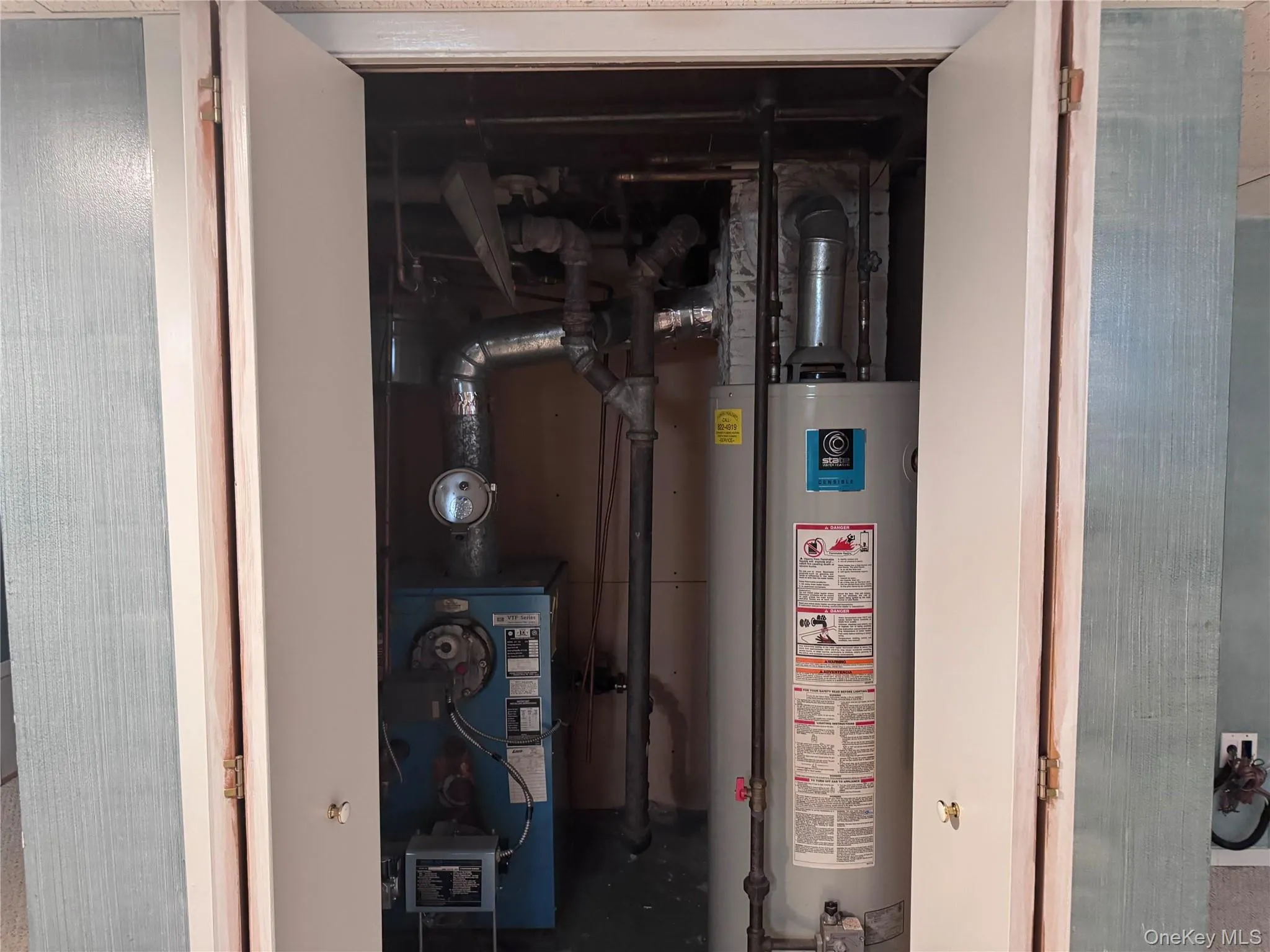 Utilities with gas water heater and a heating unit Utilities with gas water heater and a heating unit