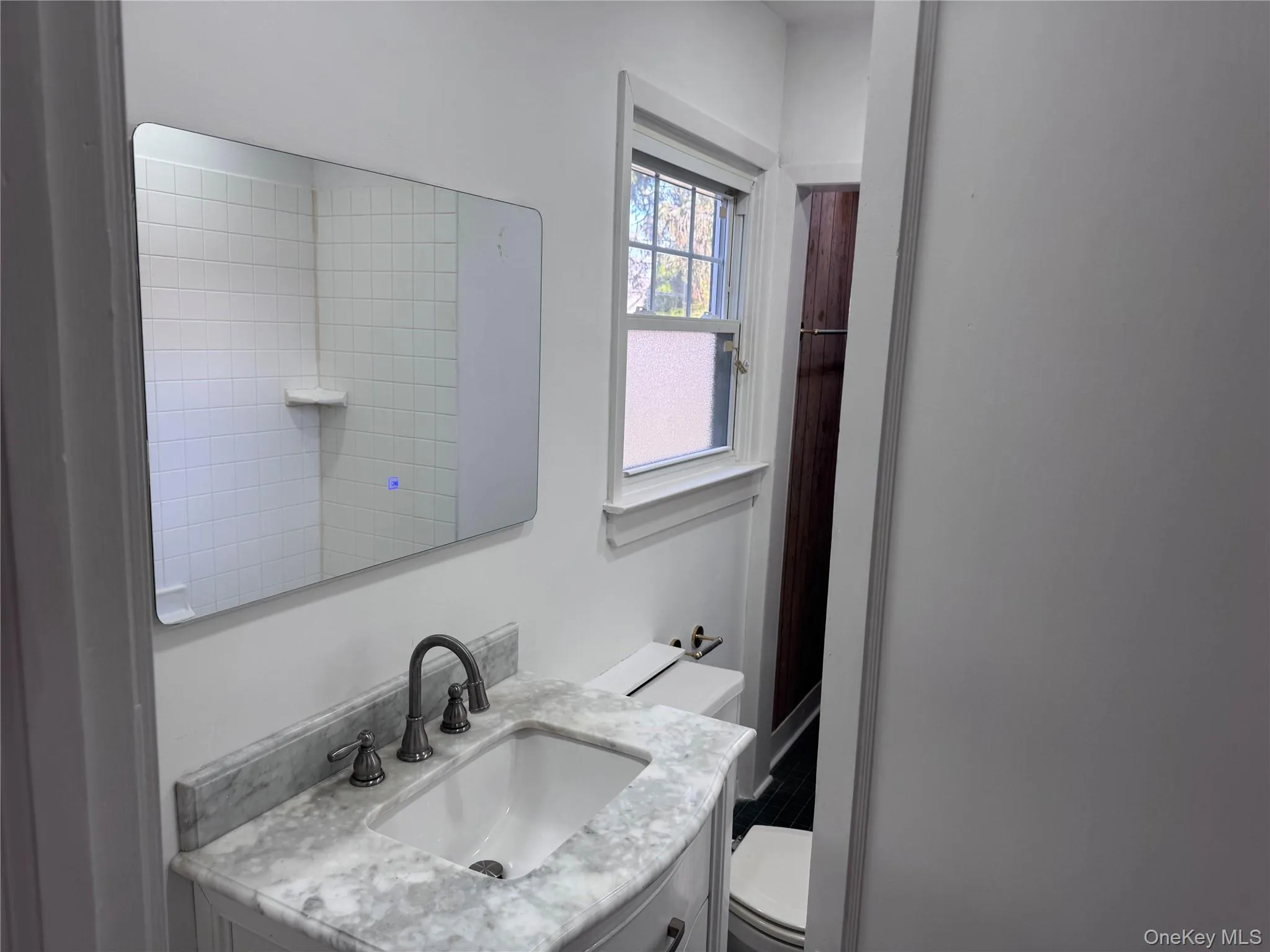 Bathroom with vanity and toilet Bathroom with vanity and toilet