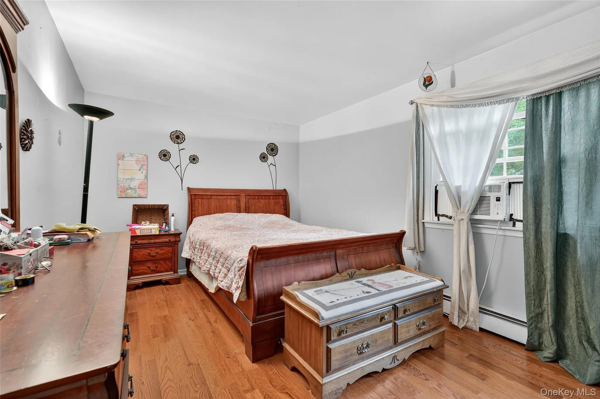 Bedroom featuring light wood-style floors Bedroom featuring light wood-style floors