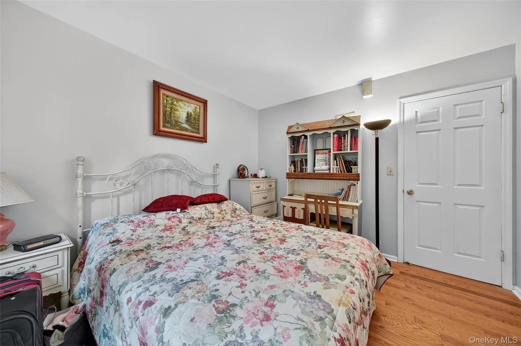 Bedroom featuring light wood-type flooring Bedroom featuring light wood-type flooring