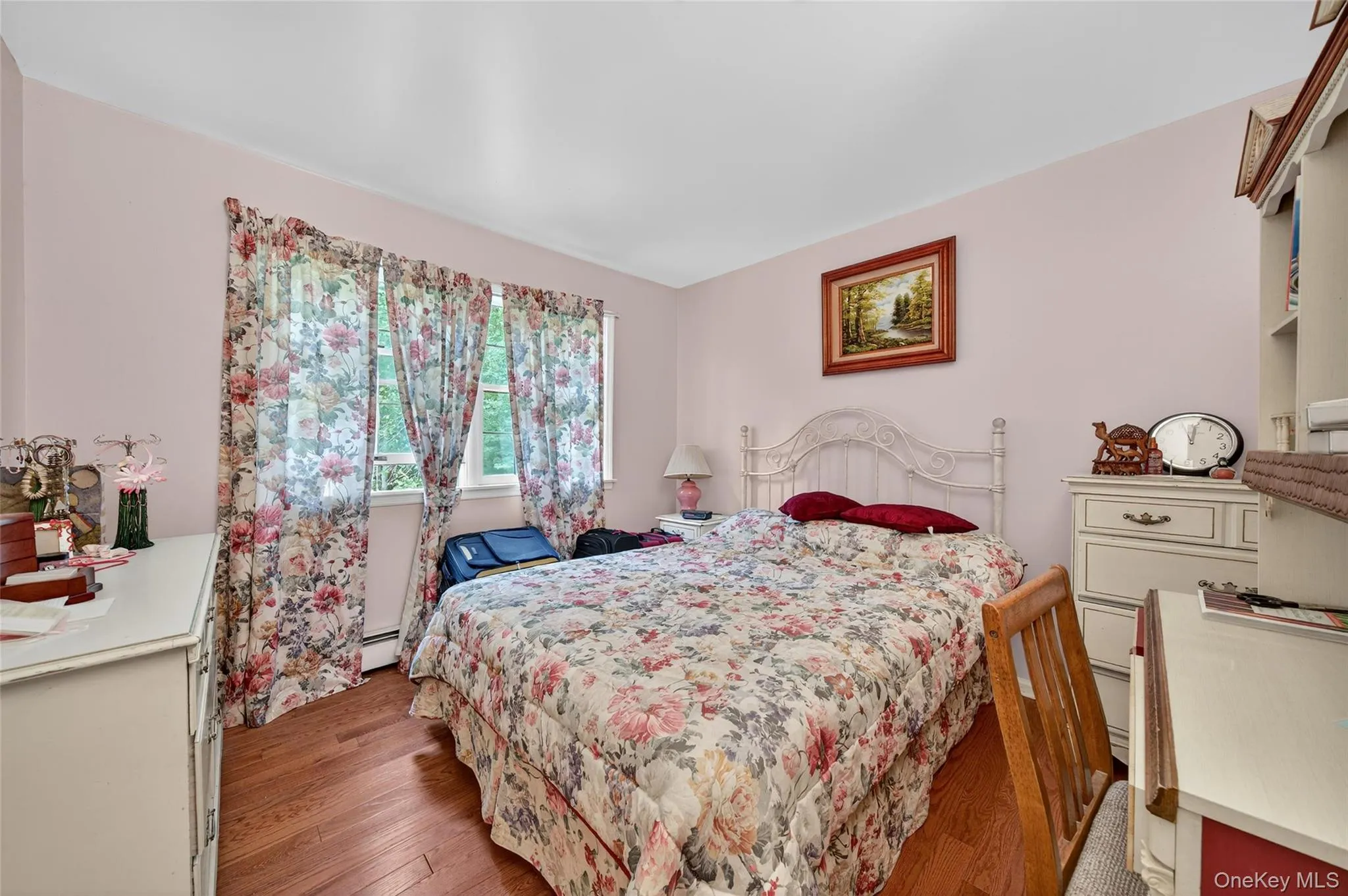 Bedroom with light wood-style floors Bedroom with light wood-style floors