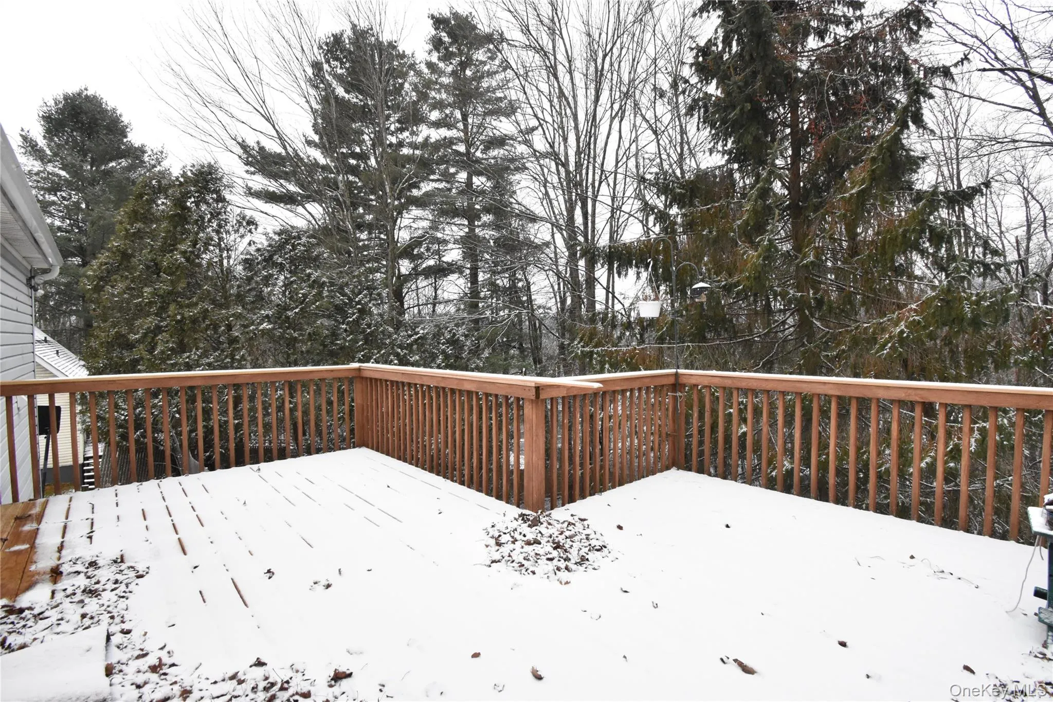 View of snow covered deck View of snow covered deck