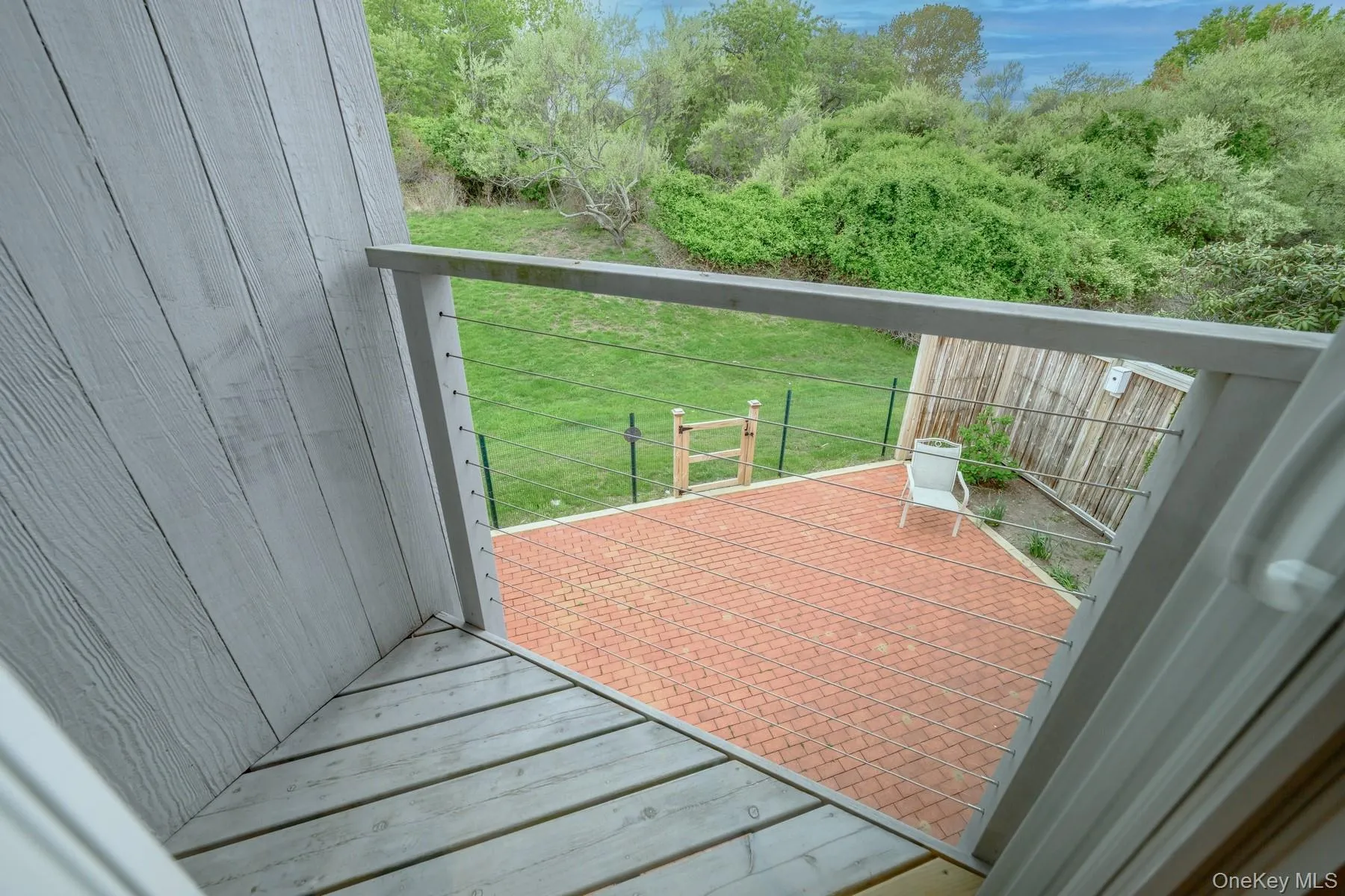 Wooden deck with a yard Wooden deck with a yard