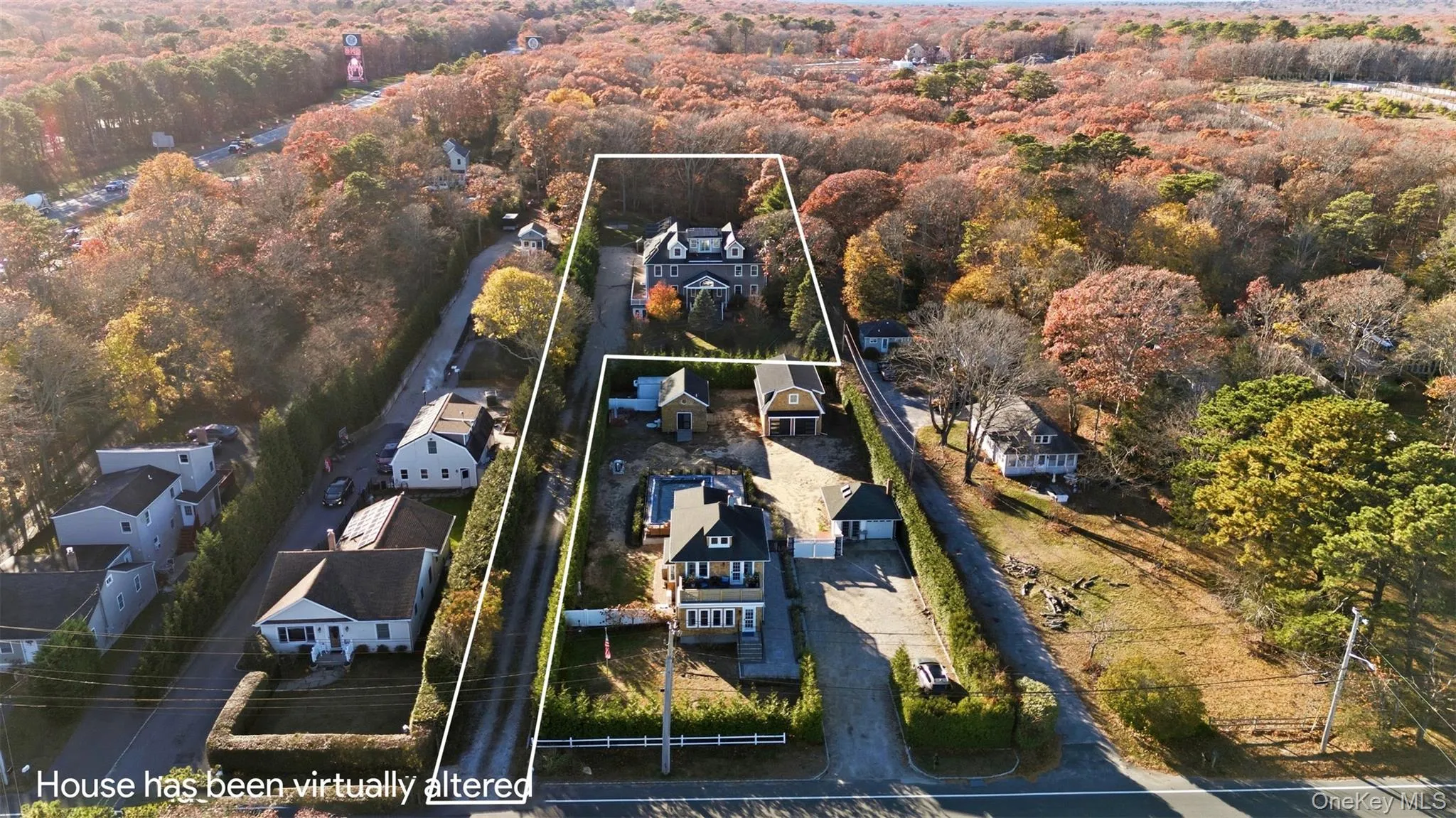 Aerial view of residential area with property boundaries highlighted and a heavily wooded area Aerial view of residential area with property boundaries highlighted and a heavily wooded area