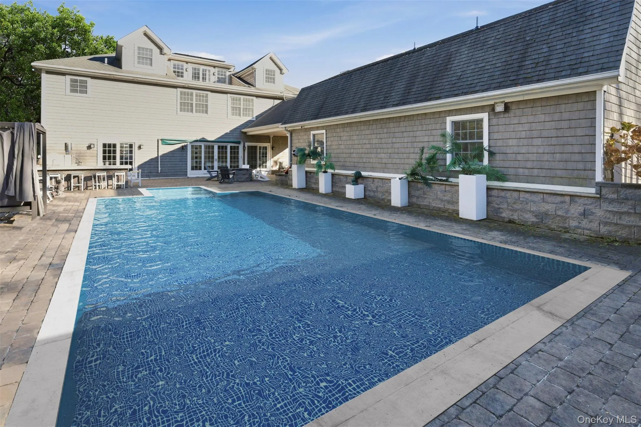 Outdoor pool featuring a patio Outdoor pool featuring a patio