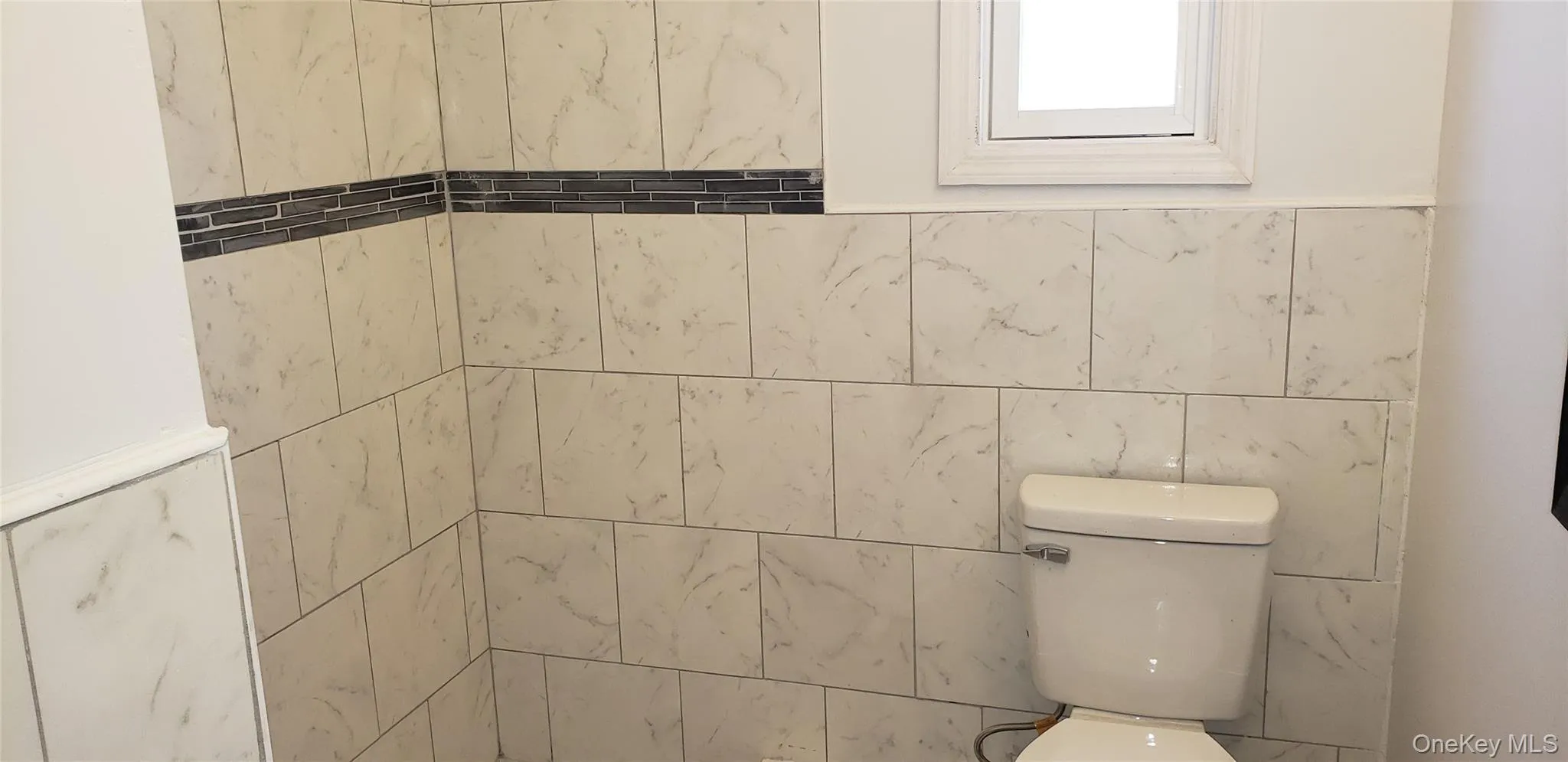 Bathroom featuring toilet Bathroom featuring toilet