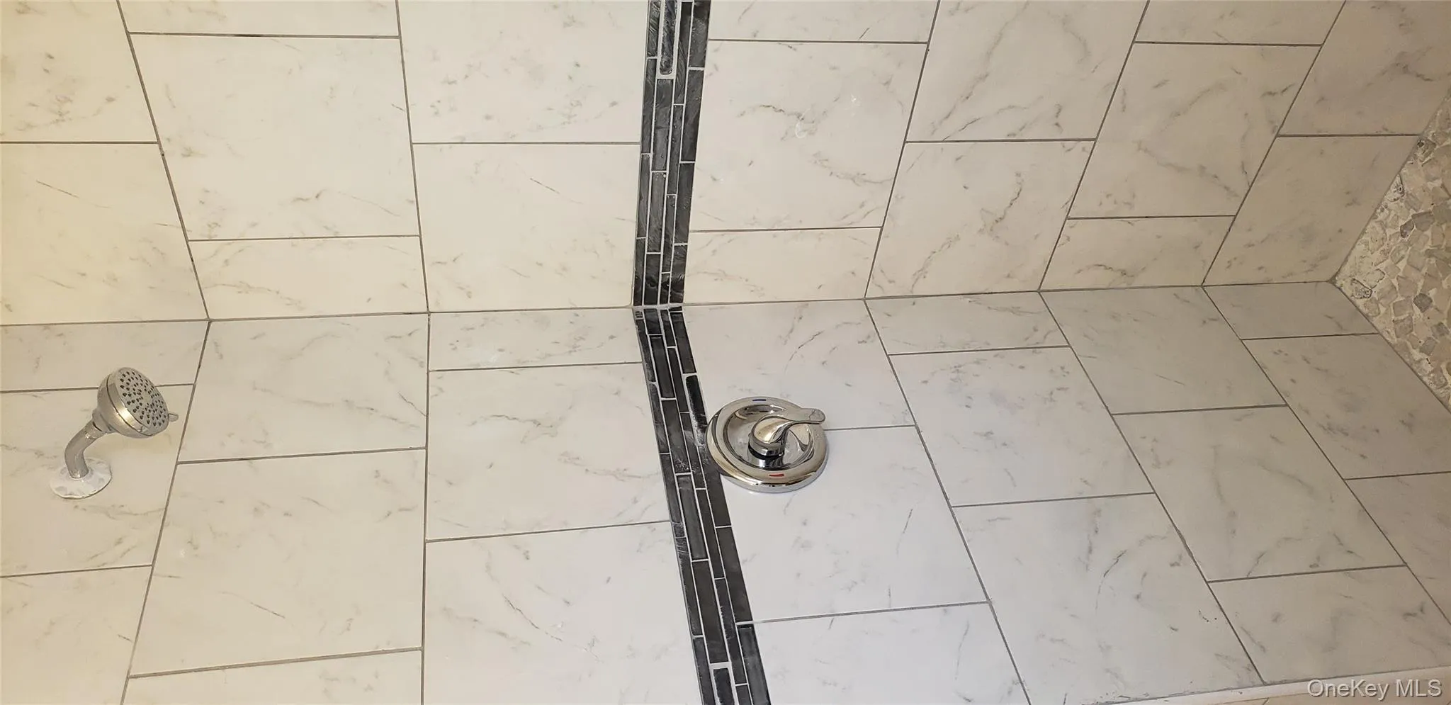 Bathroom view of tiled shower Bathroom view of tiled shower