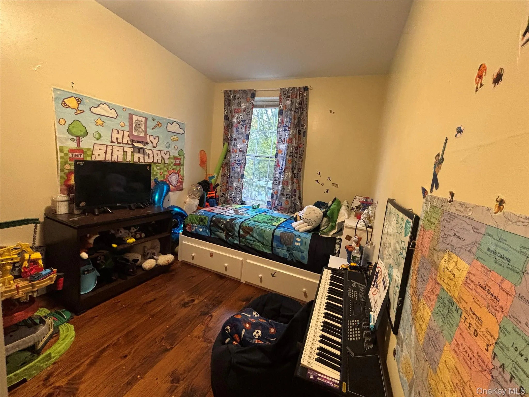 Bedroom featuring dark wood-type flooring Bedroom featuring dark wood-type flooring