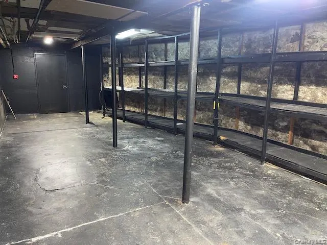 View of unfinished below grade area View of unfinished below grade area