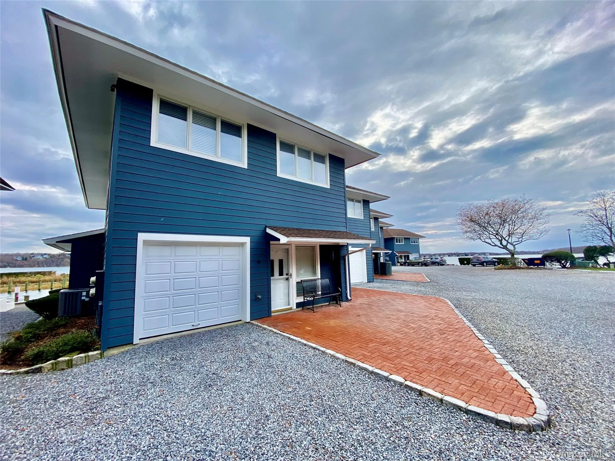 View of front facade featuring a garage View of front facade featuring a garage