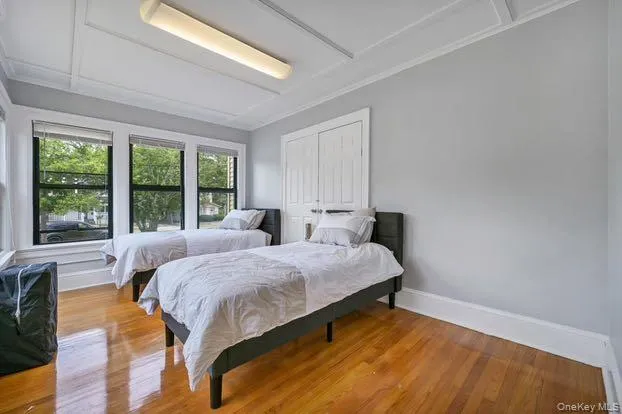 Bedroom with wood finished floors Bedroom with wood finished floors