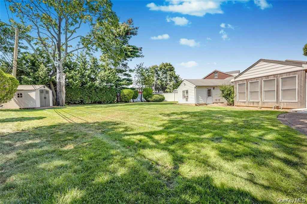 View of yard featuring a storage shed View of yard featuring a storage shed