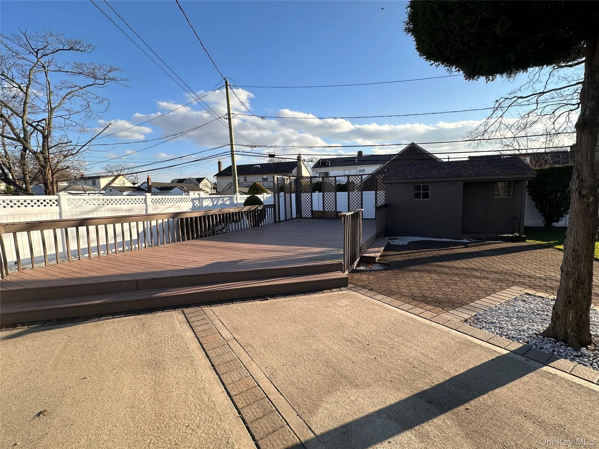 Wooden deck with an outdoor structure Wooden deck with an outdoor structure