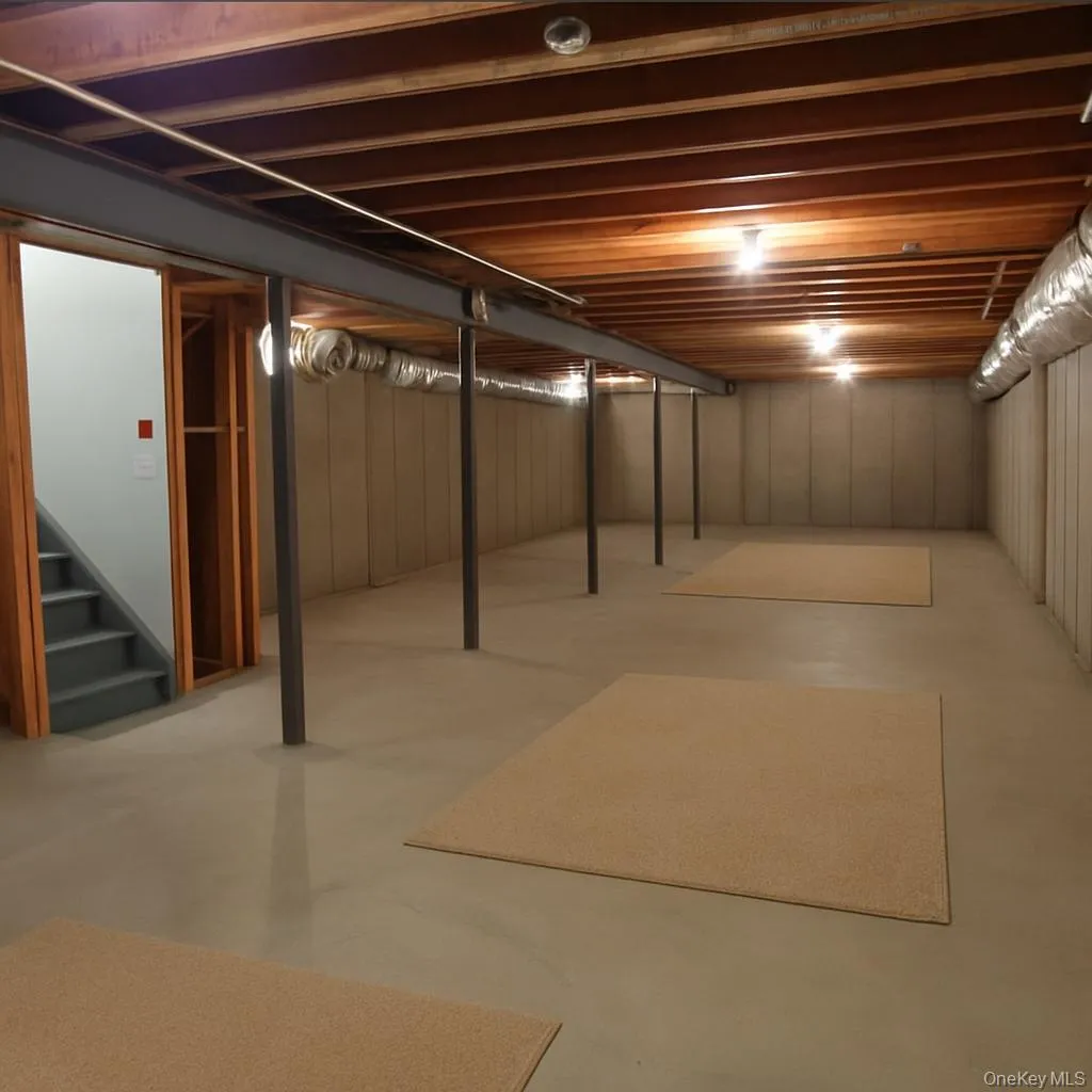 Virtually decluttered Unfinished below grade area for storage Virtually decluttered Unfinished below grade area for storage