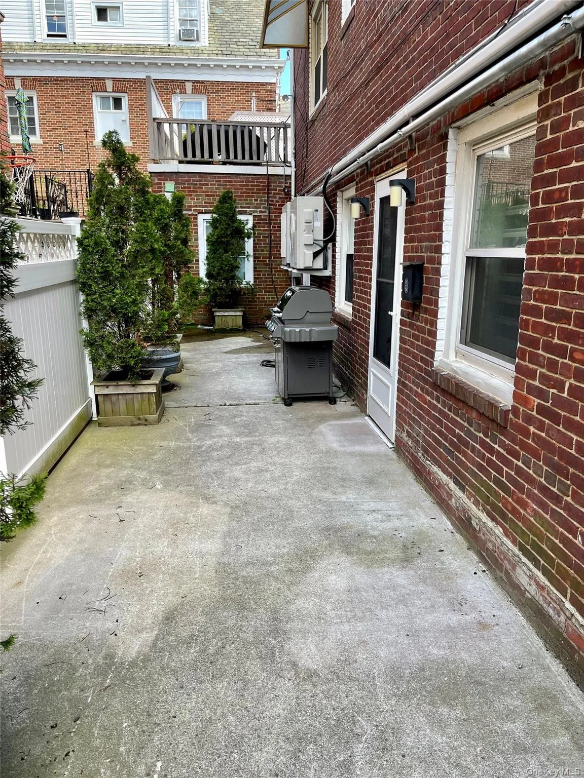 View of patio with a grill View of patio with a grill