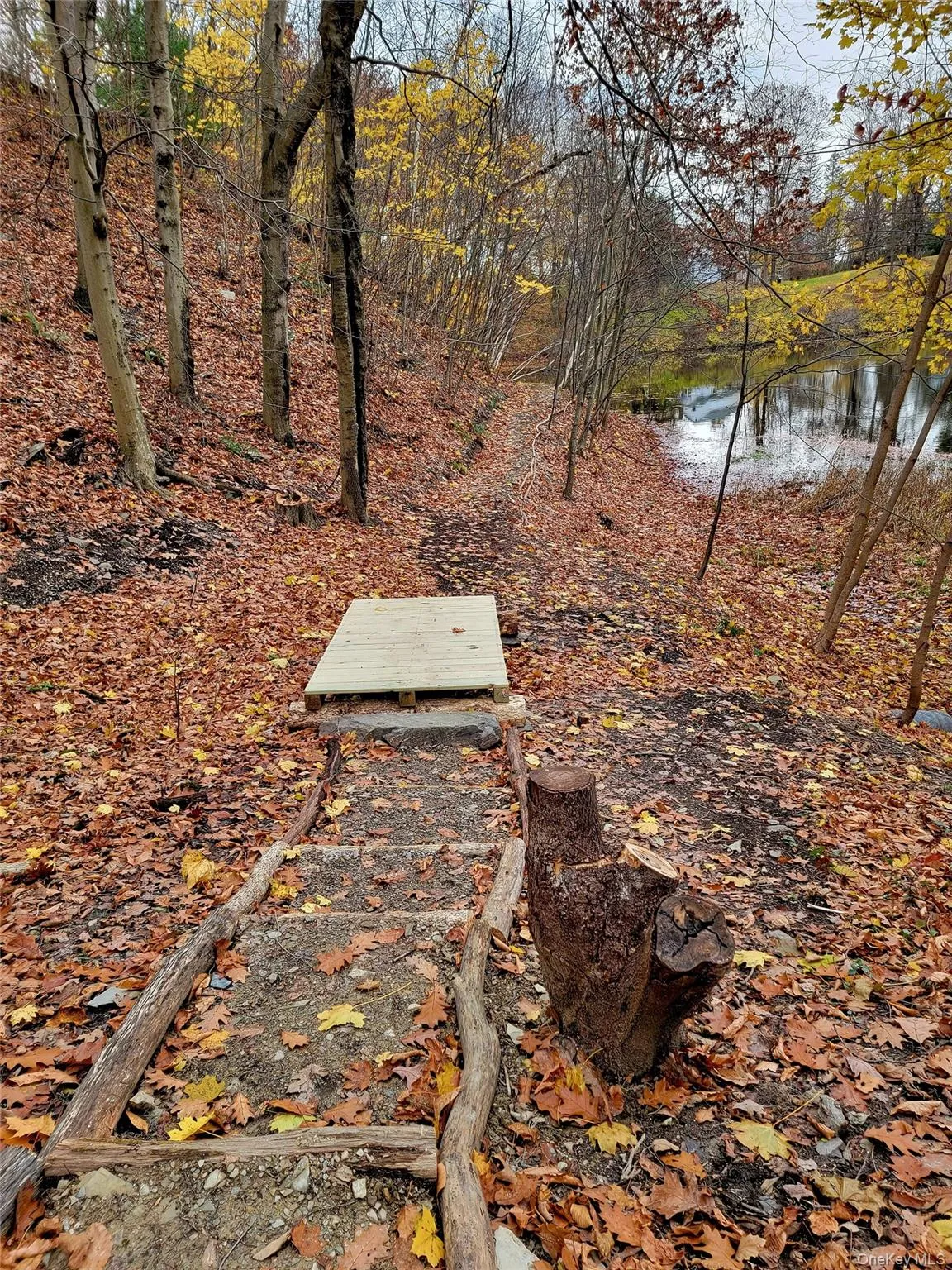 View of yard with a water view View of yard with a water view