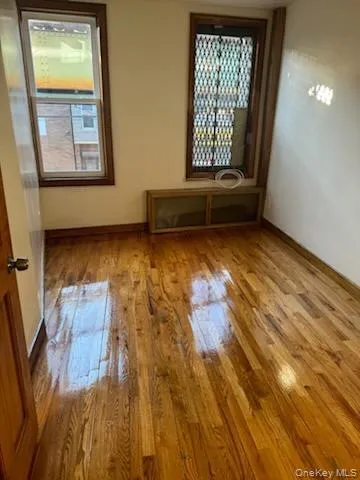 Unfurnished room with light wood-type flooring Unfurnished room with light wood-type flooring