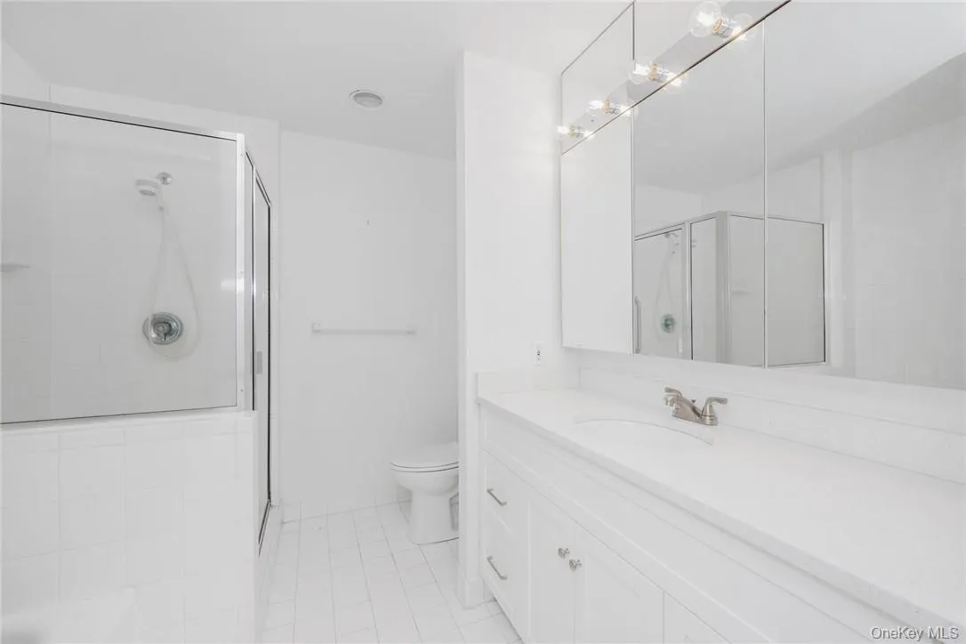 Primary bathroom features new vanity, quartz counter, walk-in shower and separate bath. Primary bathroom features new vanity, quartz counter, walk-in shower and separate bath.