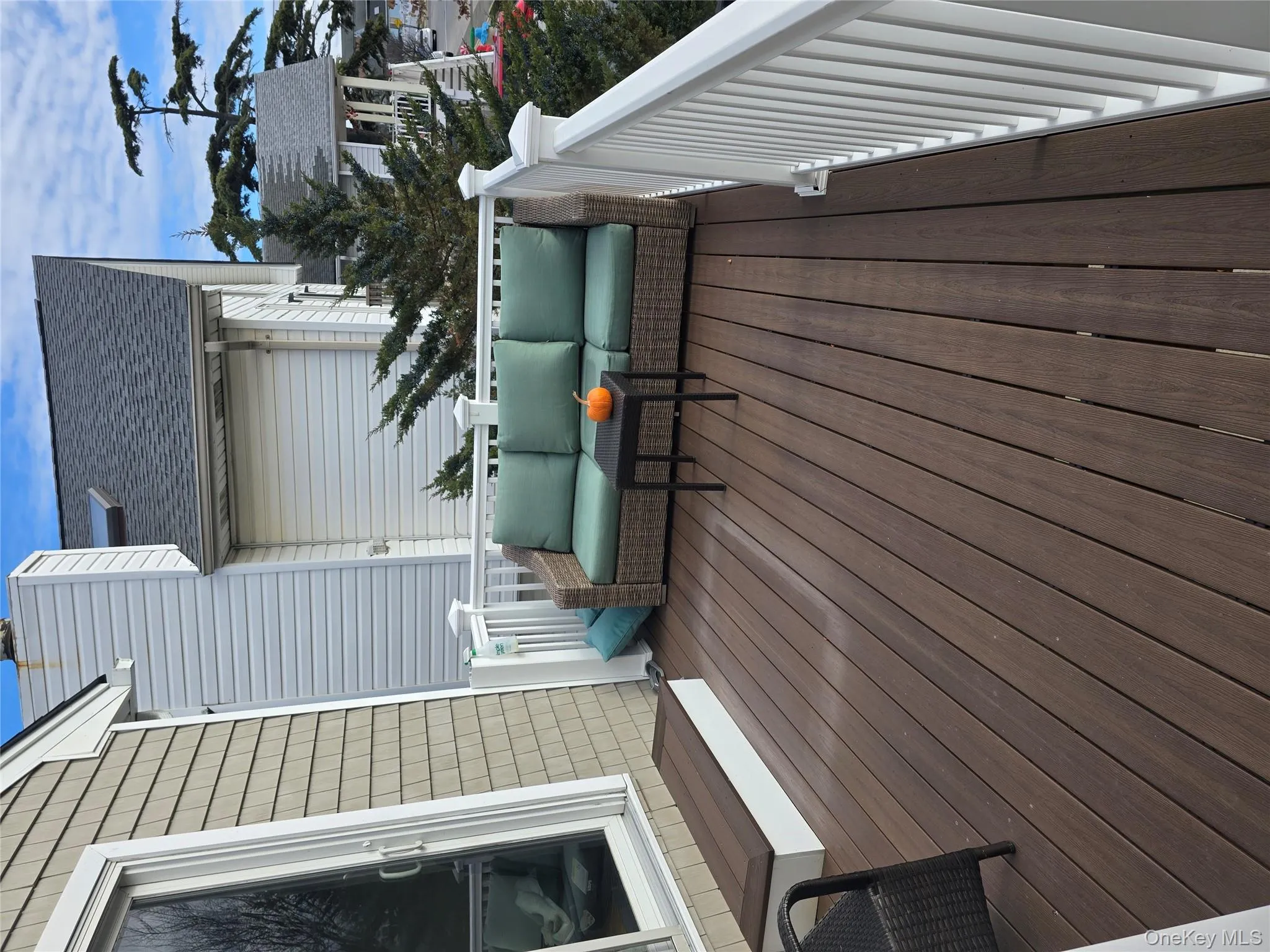 Wooden deck featuring outdoor lounge area Wooden deck featuring outdoor lounge area