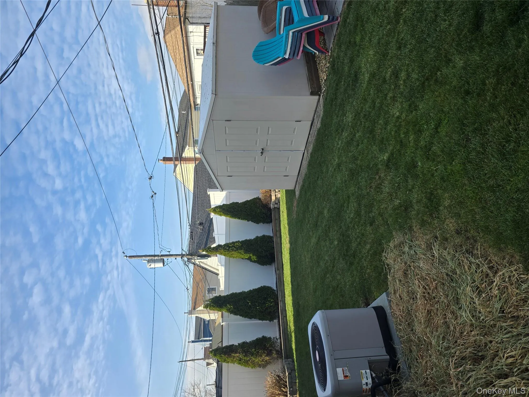 View of yard featuring a storage shed View of yard featuring a storage shed