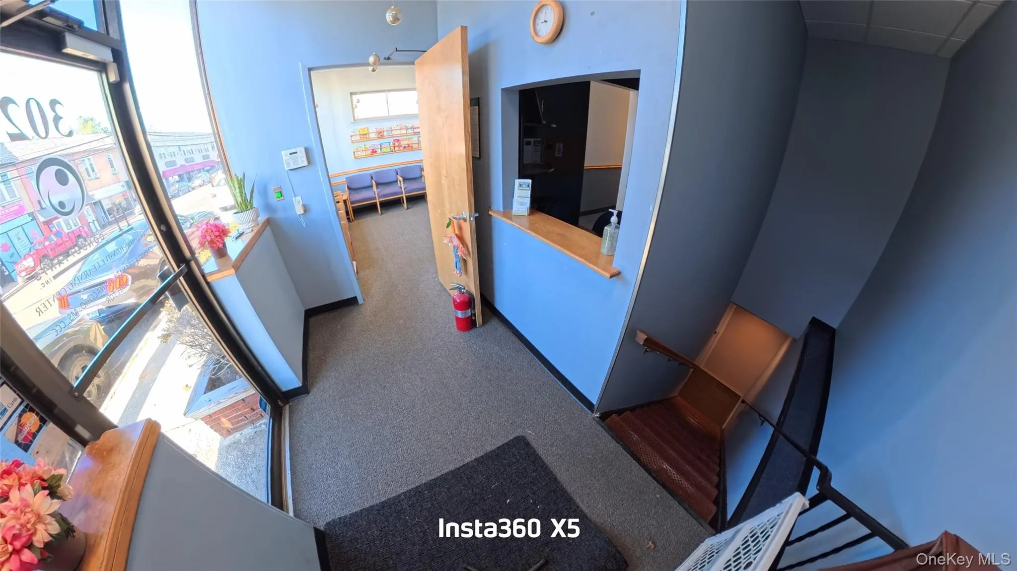 Entry to door with stairs that lead to the space Entry to door with stairs that lead to the space