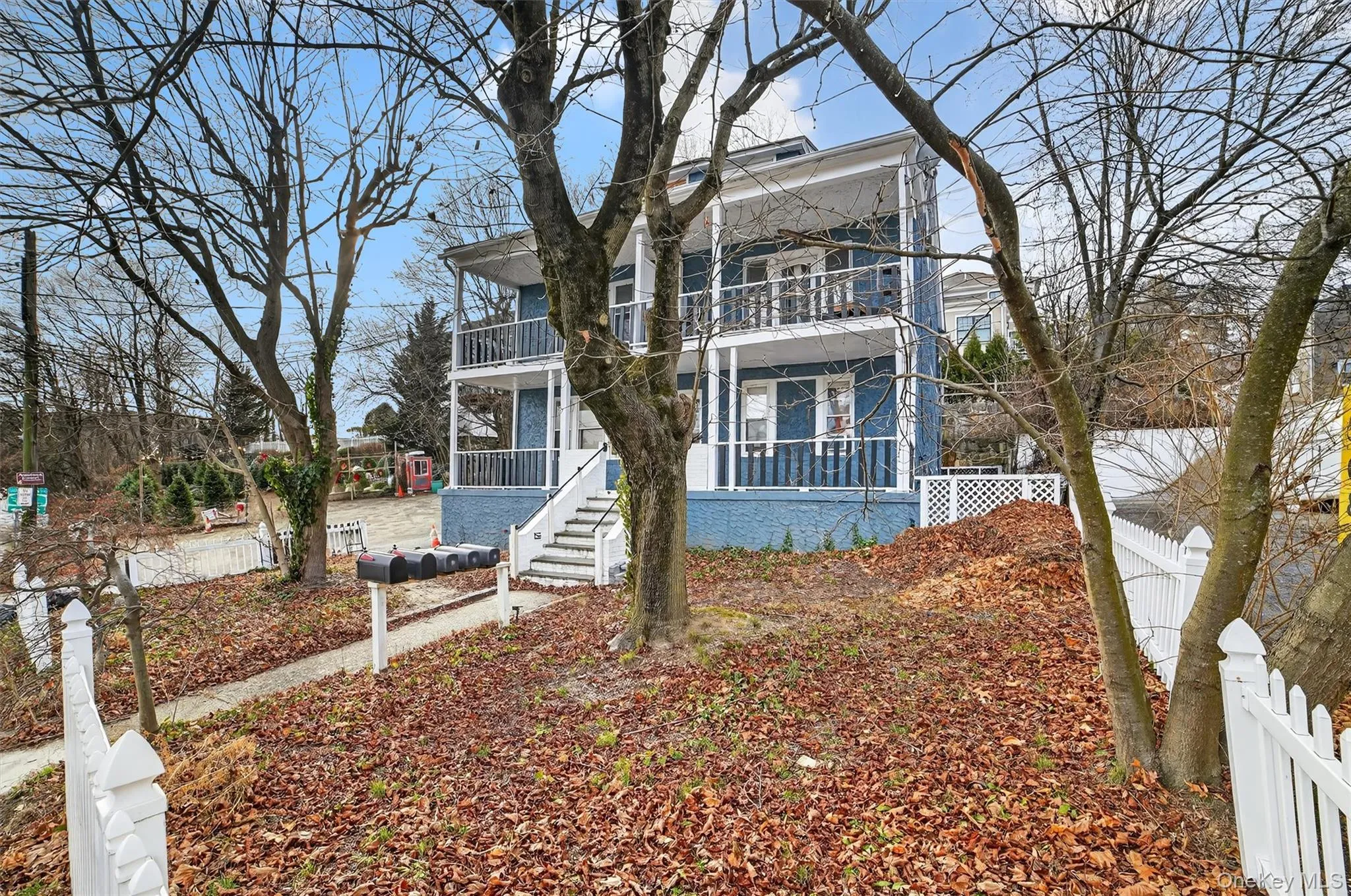 Traditional home featuring a porch and a balcony Traditional home featuring a porch and a balcony
