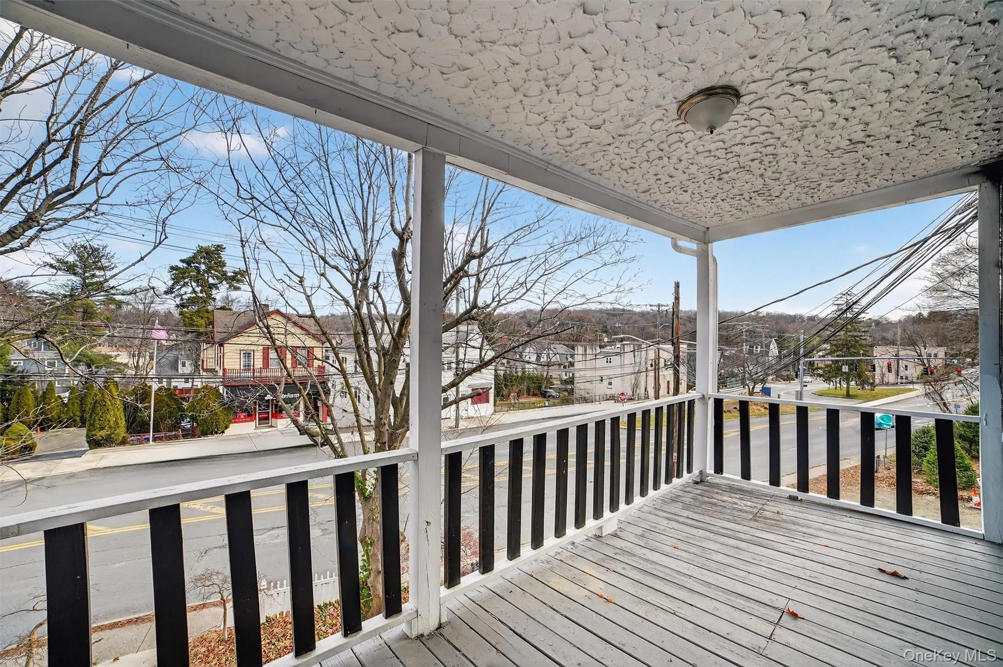 Wooden deck featuring a residential view Wooden deck featuring a residential view