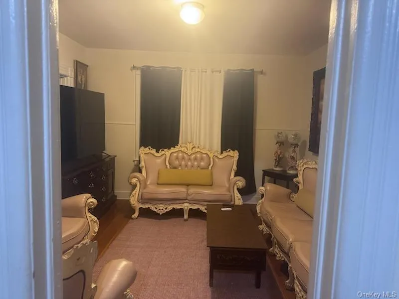 Living room with light wood-style flooring Living room with light wood-style flooring