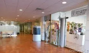 Community lobby featuring a drop ceiling Community lobby featuring a drop ceiling