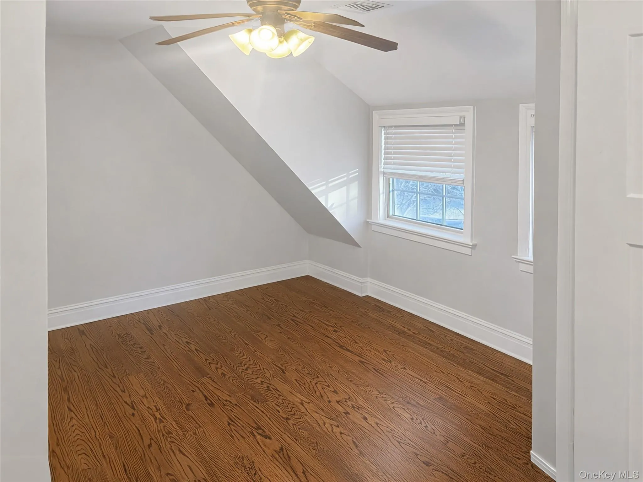 Secondary Bedroom with hardwood floors. Secondary Bedroom with hardwood floors.