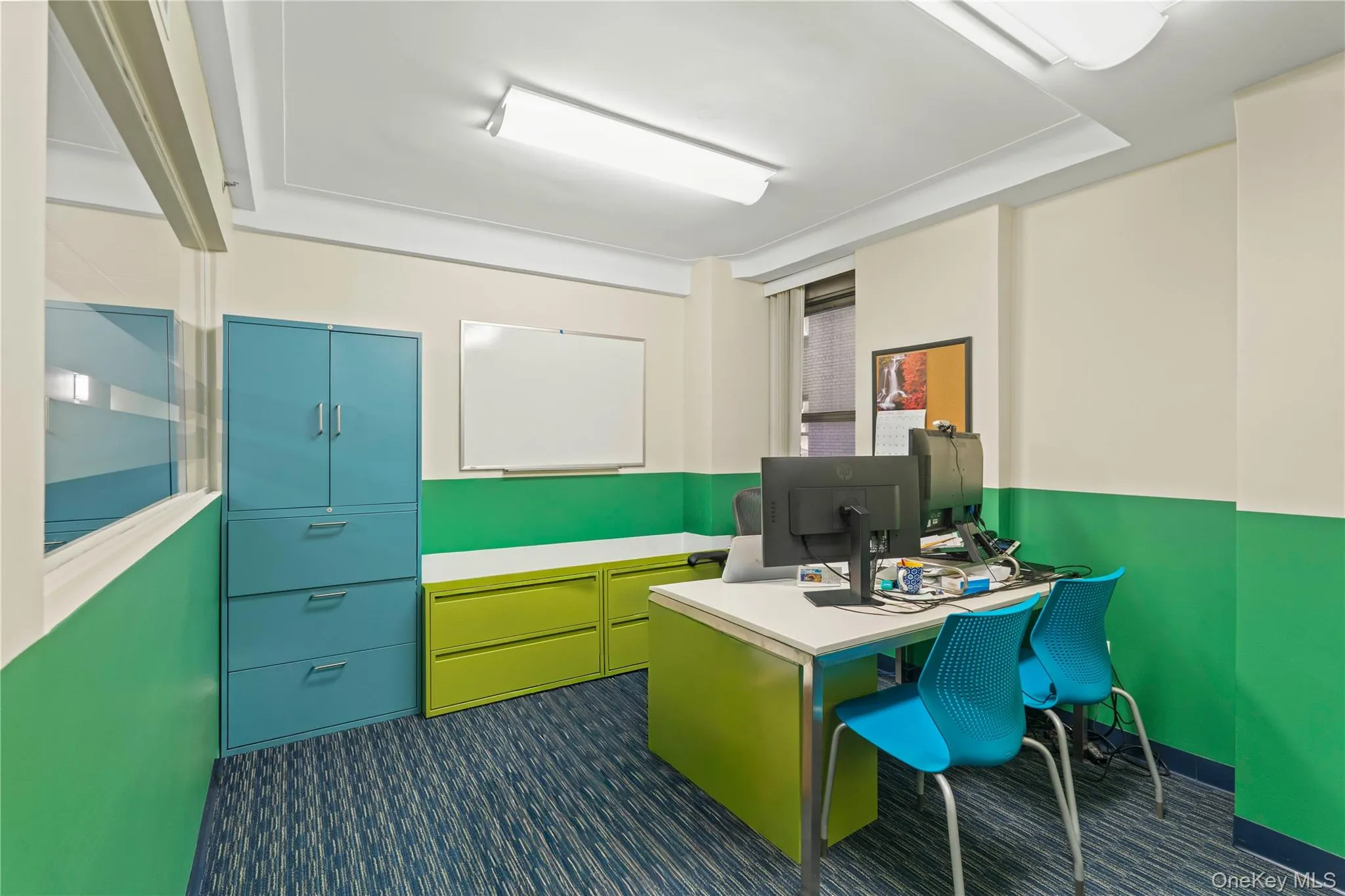 Office featuring dark carpet Office featuring dark carpet