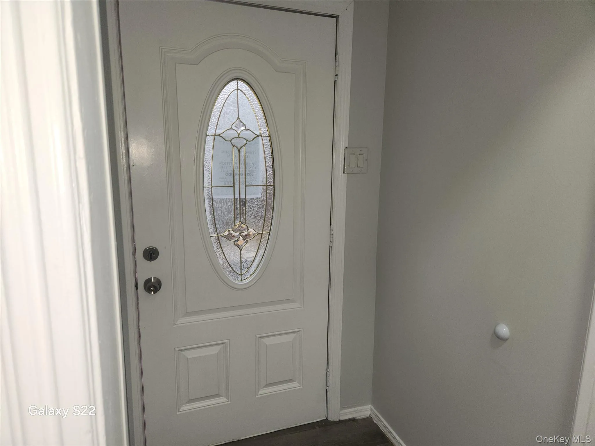 Foyer featuring baseboards Foyer featuring baseboards