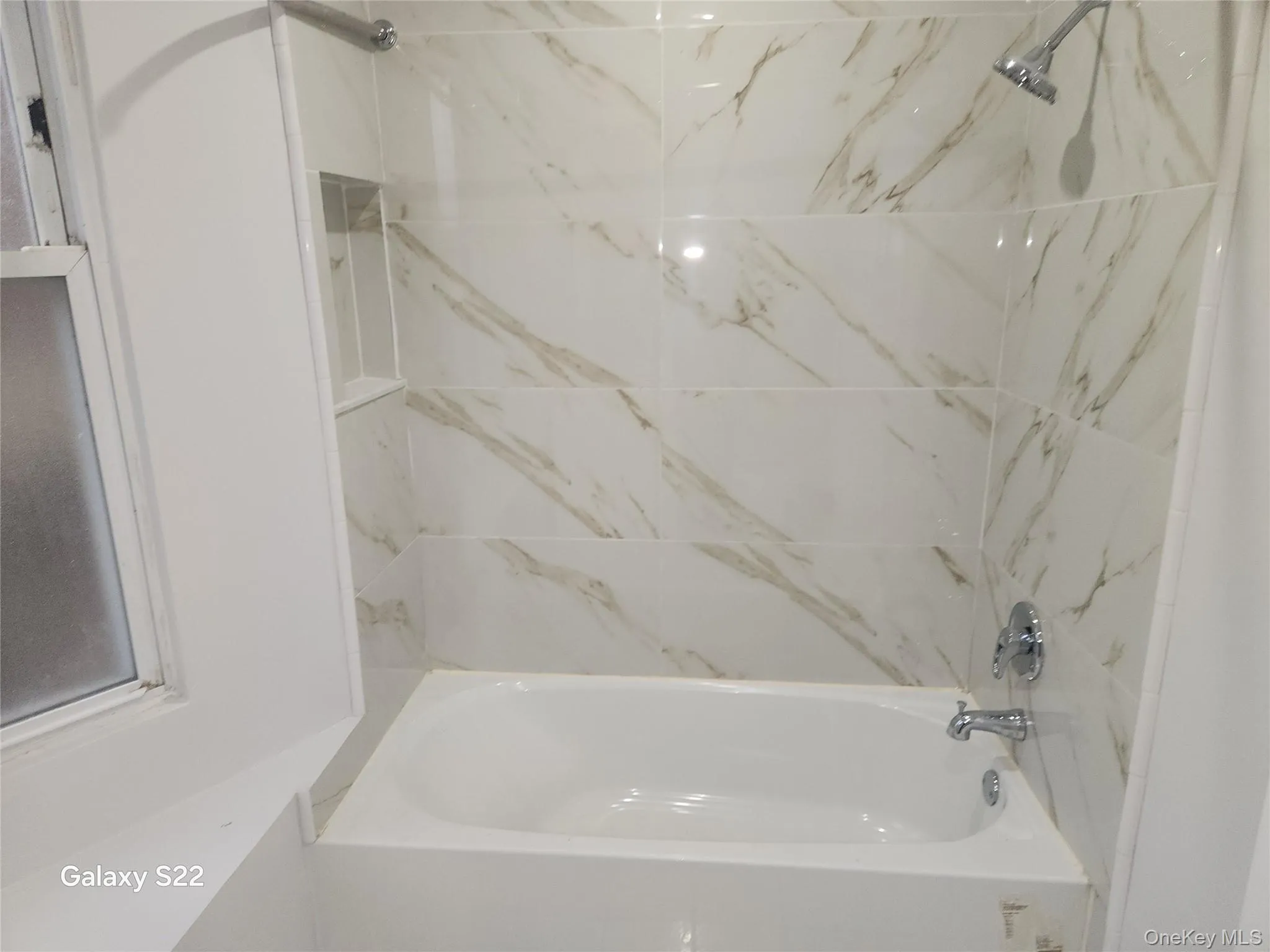 Full bath featuring shower / washtub combination Full bath featuring shower / washtub combination