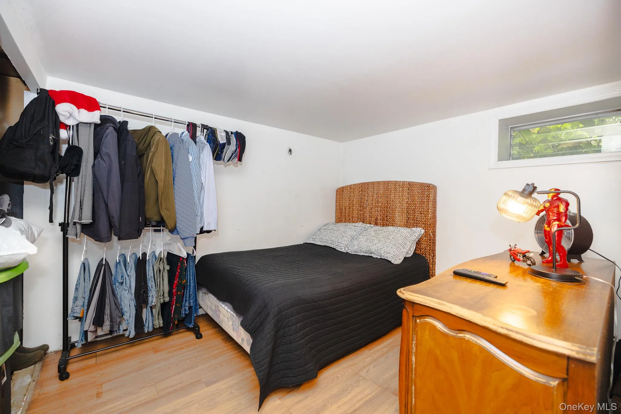Bedroom featuring light wood-style flooring Bedroom featuring light wood-style flooring